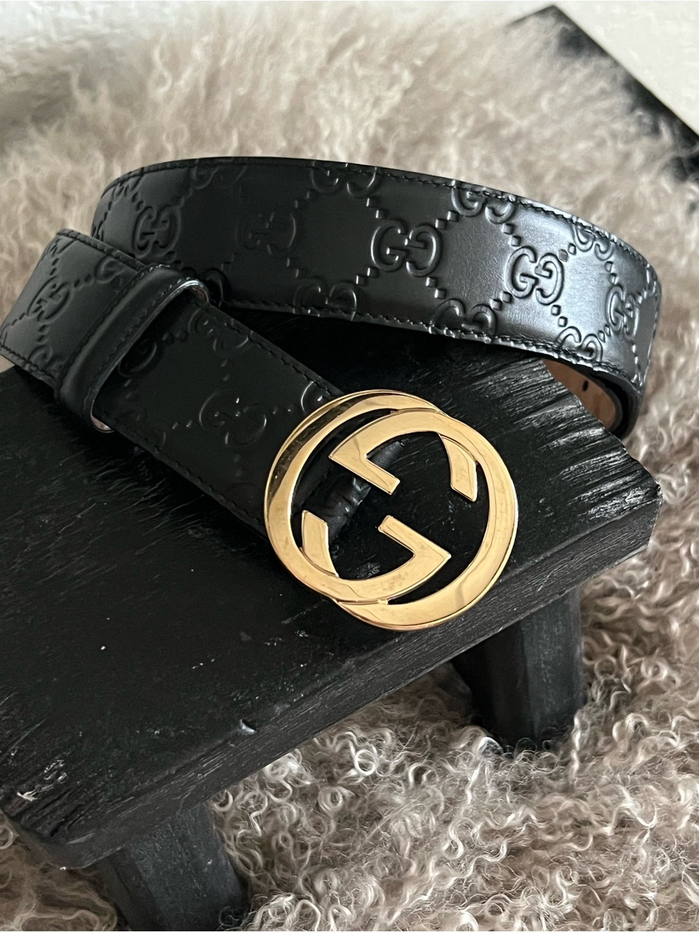 Gucci Guccissima embossed leather belt with the Interlocking G gold tone buckle.